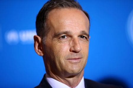 　ドイツのマース外相は６日、イラクが駐留米軍を追い出せば制裁を発動するというトランプ米大統領の警告は「あまり有益でない」との認識を示した。写真は国連の世界難民フォーラムに出席したマース氏。２０１９年１２月、スイスのジュネーブで撮影（２０２０年　ロイター/Denis Balibouse）