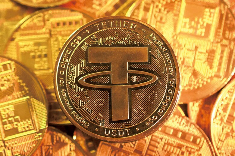 ステーブルコインは敵か味方か　PHOTO ILLUSTRATION BY DADO RUVICｰREUTERS