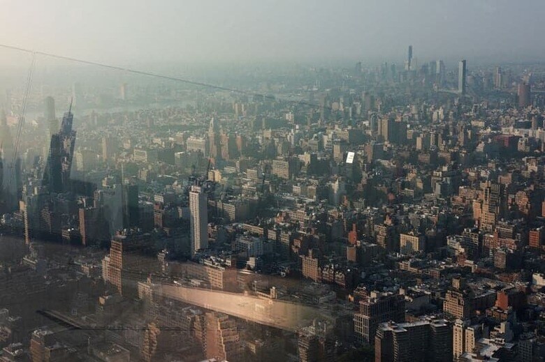 ３月１８日、日本企業による海外企業のＭ＆Ａ（合併・買収）が活発化している。写真はニューヨークのビル群。２０２３年７月撮影（２０２４年　ロイター/Amr Alfiky）