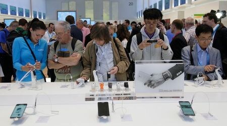 Visitors look at the latest Samsung products during the opening day of the IFA consumer electronics fair in Berlin September 6, 2013. The IFA consumer electronics and home appliances fair will open its doors to the public from September 6 till 11 in the G