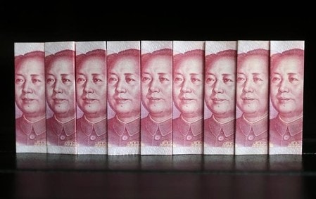 　４月１９日、上海証券報は、中国政府が不良債権処理の新たな手段として、年内に一部の中堅銀行に対し、不良債権を原資産とする資産担保証券（ＡＢＳ）の発行を認める方針だと伝えた。写真は中国・北京で２０１３年７月撮影（２０１７年　ロイター／Jason Lee）