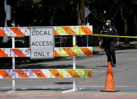　８月１０日、米ワシントン州シアトル市の議会は、市警察向け予算を１％弱削減することを承認した。写真はシアトルで７月撮影（２０２０年　ロイター／Lindsey Wasson）