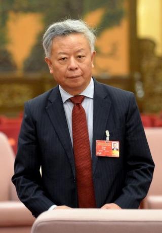 ９月１８日、中国が主導する新たな国際金融機関、アジアインフラ投資銀行（ＡＩＩＢ）は、今でこそ中国の国際政治における成功事例とみられているが、２年前には計画がほとんど棚上げされるところだった。写真は初代のＡＩＩＢ総裁に就任する金立群氏。６月撮影(２０１５年　ロイター / POOL/WANG ZHAO）