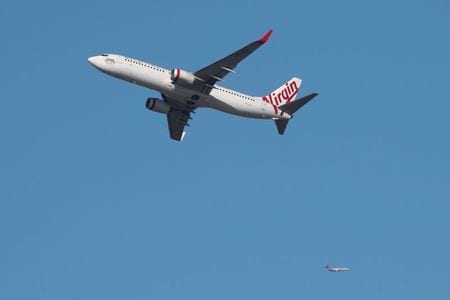 米プライベートエクイティ投資会社のベインキャピタルは２６日、経営破綻した豪航空会社ヴァージン・オーストラリア・ホールディングスの買収で管財人と合意したと発表した。３月撮影（２０２０年　ロイター/Loren Elliott）