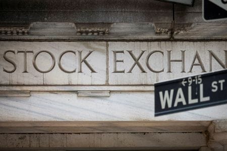 The Wall Street entrance to the New York Stock Exchange (NYSE) is seen in New York City, U.S., November 15, 2022. REUTERS/Brendan McDermid