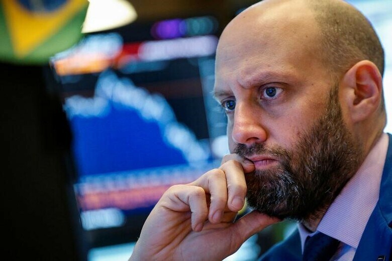 ６月２０日、貿易を巡る米中対立がエスカレートし、米国株式市場には激震が走ったかもしれないが、一部投機筋は全面的な貿易戦争にさらされる米企業に対する絶好の空売り機会だと捉えている。ＮＹ証券取引所で５月撮影（２０１８年　ロイター/Brendan McDermid）