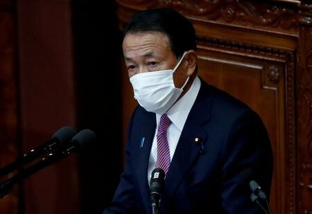 　５月１４日、麻生太郎財務相は閣議後会見で、２０２１年度一般会計補正予算案を編成する可能性について「直ちに編成を考えているわけではない」との認識を示した。１月撮影（２０２１年　ロイター/Issei Kato）