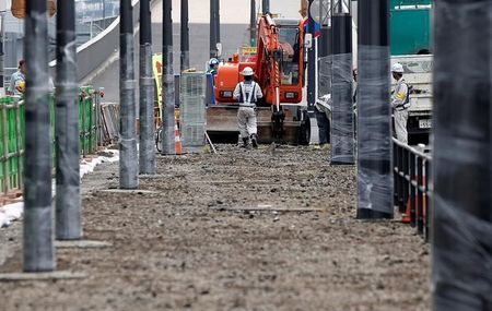 Heavy machinery is seen in front of new Tokyo Metropolitan Central Wholesale Market, known as Toyosu Market which will take over from the famous Tsukiji market as early as next year, under construction in the Toyosu district in Tokyo, Japan, September 12,