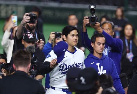 　３月２６日、米大リーグのドジャースは、東京エレクトロンおよび旅行大手のＪＴＢと複数年のパートナーシップ契約を結んだと発表した。写真は、同チームの大谷翔平選手。３月１９日、東京ドームで撮影（２０２５年　ロイター/Kim Kyung-Hoon）