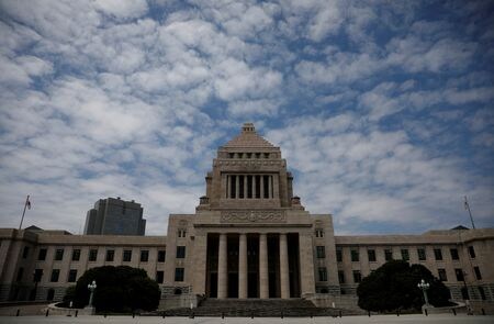　１０月１４日、国会筋によると、政府側から臨時国会を２１日に召集するとの通達があり、参院国対委員長会談で自民党が立憲民主党に伝えたという。写真は国会議事堂。２０２１年５月撮影（２０２５年　ロイター/Kim Kyung-Hoon）