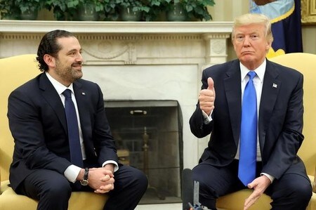 　７月２５日、トランプ米大統領（写真右）は、イスラム国（ＩＳ）などの過激派組織が国内に地歩を確保するのを防いでいるとして、レバノンの国境警備努力を賞賛するとともに、支援の継続を約束した。左はレバノンのハリリ首相、ホワイトハウスで撮影（２０１７年　ロイター/Carlos Barria）