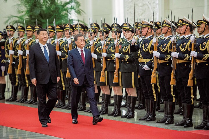 就任後初めて訪中した韓国の文在寅大統領　Nicolas Asfouri-REUTERS