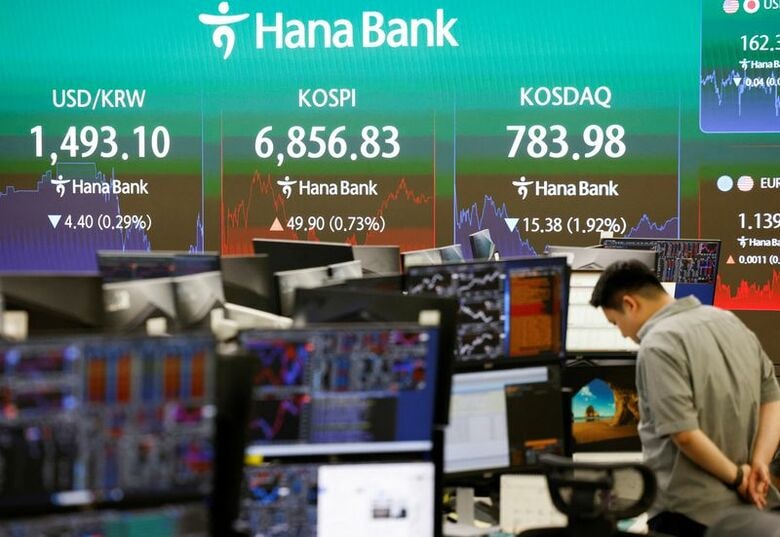 ソウルの銀行のディーリングルームで7月14日撮影。REUTERS/Kim Soo-hyeon