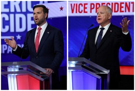 　１０月１日夜に行われた米大統領選の副大統領候補によるテレビ討論会を見た視聴者は大いに驚いた。写真は論戦する民主党のウォルズ候補（右）と共和党のバンス候補。ニューヨークで撮影（２０２４年　ロイター/Mike Segar）