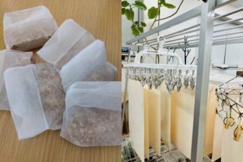 桜のチップを茶葉用の袋に入れ、白い紙とともに水へ。乾燥させると、幹や枝からでも淡い桜色がにじみ出る