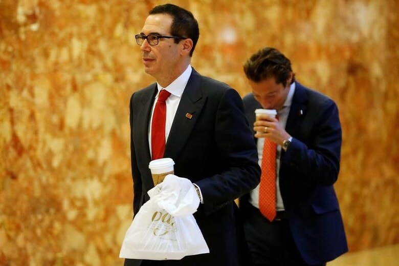 １１月１５日、アイカーン氏は、次期米財務長官にスティーブ・ムニューチン氏を起用するなどと語った。写真はムニューチン氏。ニューヨークで１４日撮影（２０１６年　ロイター／Carlo Allegri）