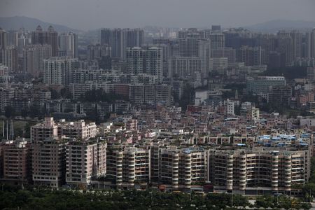 　中国の王東偉・副財政相は１日、北京で会見し、２０２３年の歳入が前年比で６．４％増加したことを明らかにした。２２年から伸びが大幅に加速した。写真は広東省・広州の風景。２００９年７月撮影（２０２４年　ロイター/Tyrone Siu）