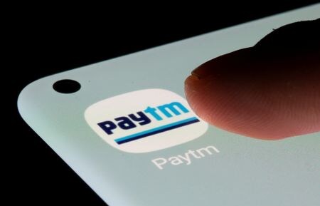 ２月４日、インドのフィンテック企業・ペイティーエムの親会社であるワン９７コミュニケーションズが発表した昨年１０─１２月期決算は、純損失が前年同期比で４５％拡大した。写真はペイティーエムのアプリ。２０２１年７月撮影（２０２２年　ロイター/Dado Ruvic）