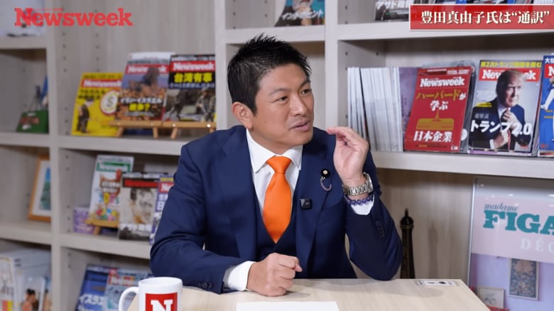 動画に出演する神谷氏（9月30日、東京都品川区）