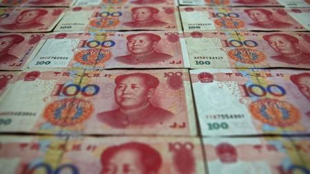 　８月２５日、中国政府は、マネーロンダリング（資金洗浄）や違法な資金移動を防止するため、３カ月間の地下銀行取り締まりを実施すると明らかにした。北京で２０１３年５月撮影（２０１５年　ロイター/Petar Kujundzic）
