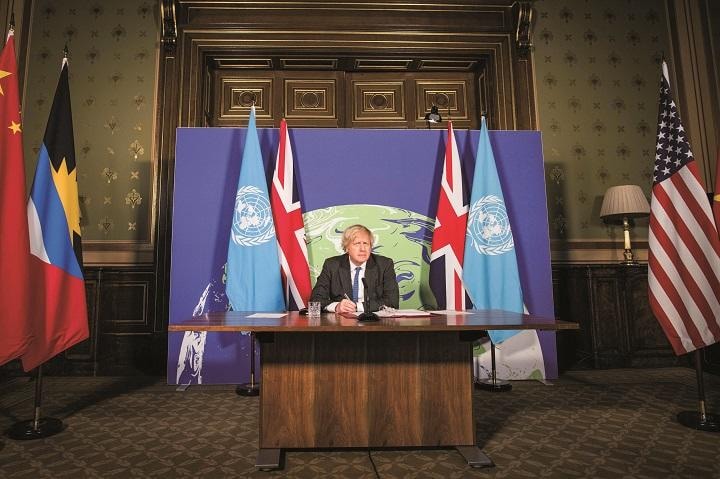 ジョンソンの気候変動問題への本気度が問われる（今年2月の国連オンライン会合）　STEFAN ROUSSEAUーREUTERS