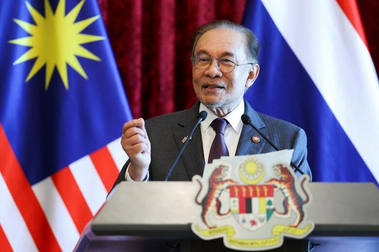 マレーシアのアンワル首相。７月、マレーシアのプトラジャヤで代表撮影。REUTERS