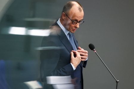 写真はメルツ首相。３月２５日、ベルリンの連邦議会で撮影（２０２６年　ロイター/リーザ・ヨハンセン）