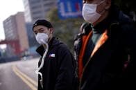 中国、新型コロナウイルス感染減少で一部の都市が緊急レベル引き下げ　