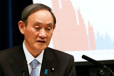　４月１２日、  菅義偉首相（写真）は男子ゴルフの松山英樹選手がマスターズ・トーナメントで初優勝したことについて、「アジアでも初の優勝で素晴らしい快挙だと思う」とコメントした。都内で３月代表撮影（２０２１年　ロイター）