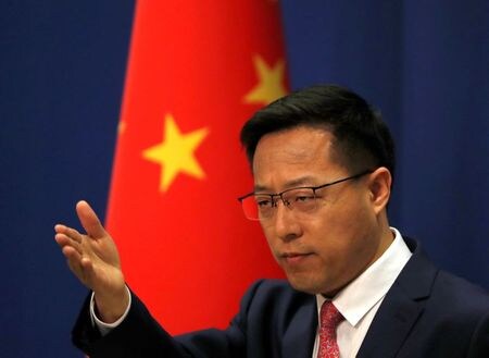 中国は１９日、米国が新型コロナウイルス危機対応の不手際を巡る自らの責任を中国に転嫁しようとしていると非難した。写真は中国外務省の趙立堅報道官。４月８日、北京で撮影（２０２０年　ロイター/Carlos Garcia Rawlins）