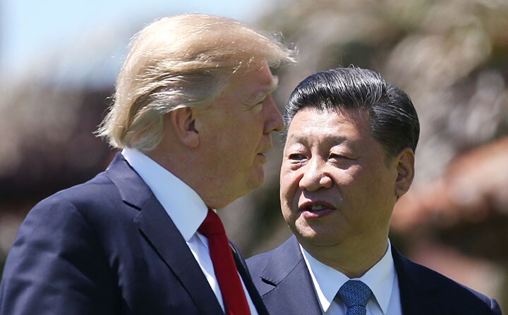 金正恩はトランプに直接対話を呼びかけることで習近平とも会うことに成功した？　Carlos Barria-REUTERS