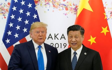トランプ次期米大統領は、１月２０日に首都ワシントンで行われる就任式に中国の習近平国家主席（右）ほか外国政府首脳を招待したことが分かった。２０１９年６月撮影（２０２４年　ロイター/Kevin Lamarque）