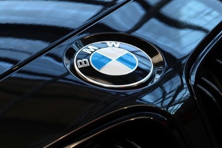 FILE PHOTO: A logo of German luxury carmaker BMW, is seen ahead of the company\'s annual news conference in Munich, Germany, March 20, 2019. REUTERS/Michael Dalder