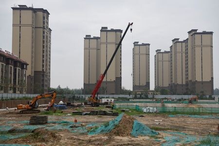 中国の民間不動産調査大手、中国指数研究院（チャイナ・インデックス・アカデミー）によると、中国不動産部門は２０２３年も引き続き統合が進み、国有企業が住宅販売・土地取得市場をほぼ独占した。写真は天津で２０２３８月撮影（２０２４年　ロイター／Tingshu Wang）