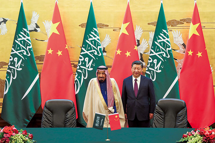 3月に会談したサルマン国王と中国の習国家主席　REUTERS