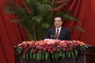 中国首相、金融改革の継続を強調　経済に「下押し圧力」