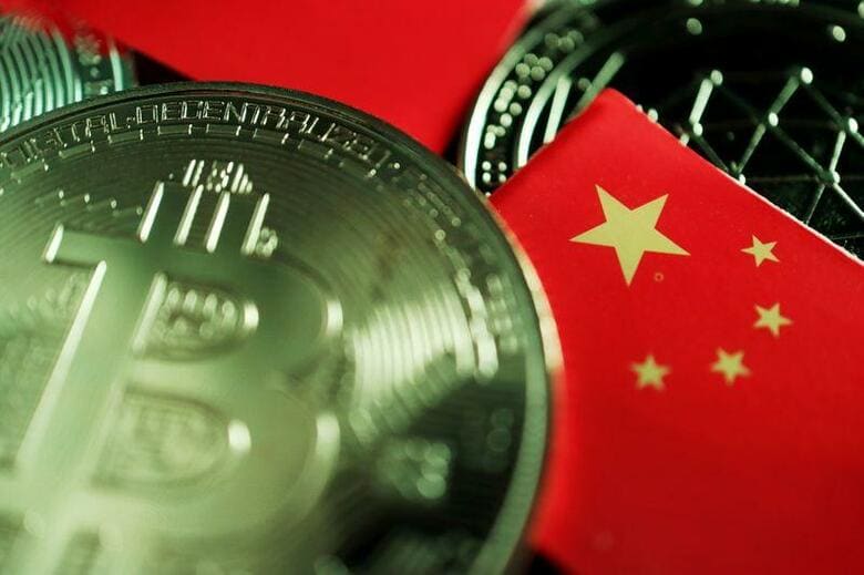 中国人民銀行（中央銀行）は、暗号資産（仮想通貨）の取引を巡る違法行為を取り締まると表明、海外の取引所がインターネットを通じて中国本土の投資家にサービスを提供することを禁止する方針を示した。６月２日撮影（２０２１年　ロイター/Florence Lo）