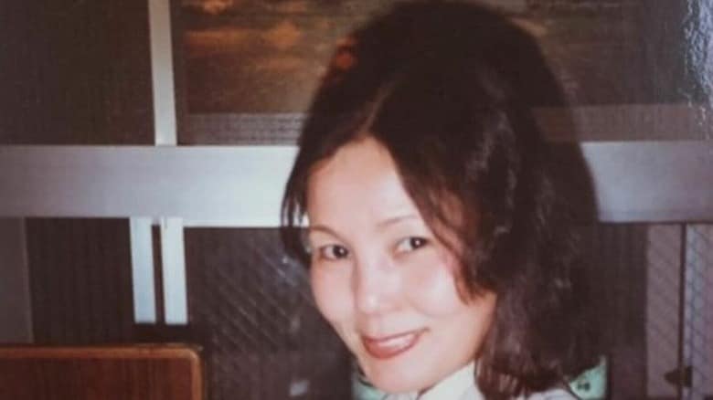 遺品のアルバムにあった「田中千津子」さんと思われる女性の写真（出所＝『ある行旅死亡人の物語』）