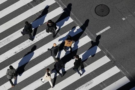 　１月２０日、政府は１月の月例経済報告で、国内景気の総括判断を「このところ一部に弱さもみられるが、緩やかな回復基調が続いている」として、前月から据え置いた。写真は都内で２０１４年１２月撮影（２０１６年　ロイター／ Issei Kato）