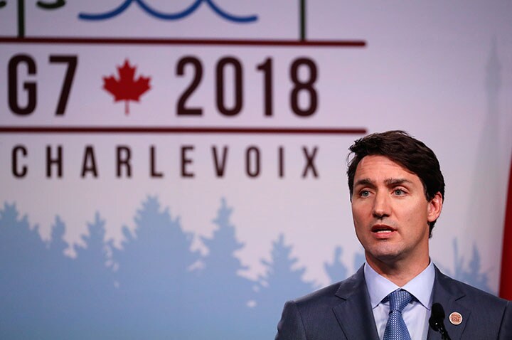 金正恩を称賛するトランプから裏切り者呼ばわりされたトルドー（写真）　Yves Herman-REUTERS