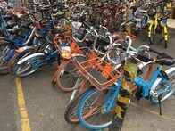 自転車シェアリング--放置か、法治か？