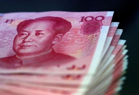 　今週の中国債券市場では、地方政府が大量の債券を発行したが、利回りに大きな変動はなく、当局が資金調達コストの低位安定を目指していることが浮き彫りとなった。写真は人民元紙幣。台北で２０１０年４月撮影（２０２１年　ロイター／Nicky Loh）