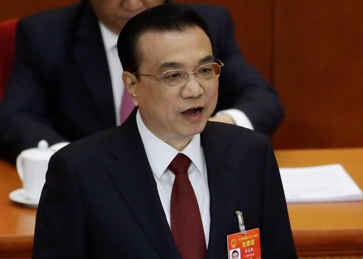 3月5日、全人代で政府活動報告をする李克強首相　Jason Lee-REUTERS