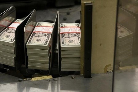 　９月２０日、ニューヨーク外為市場では、。日米の金融政策会合結果公表を前に積極的な取引が手控えられ、ドルは小動き。ワシントンの財務省印刷局で昨年３月撮影（２０１６年　ロイター／Gary Cameron）