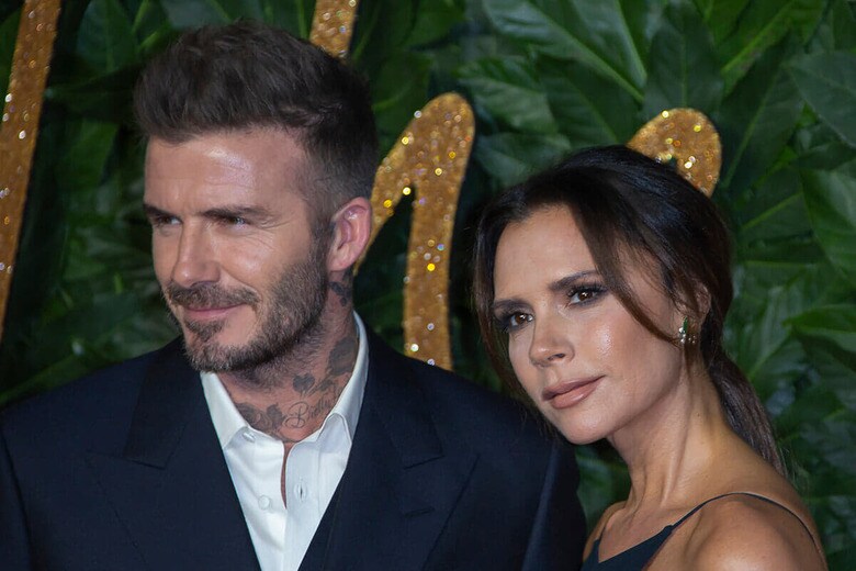 デビッド・ベッカムと妻ビクトリア（2018年12月、ロンドン）　BAKOUNINE-Shutterstock