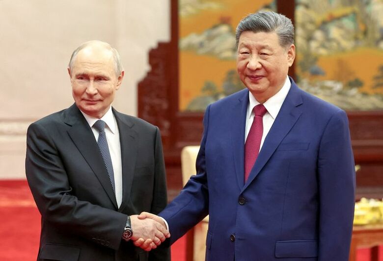 中国・北京の人民大会堂で会談したプーチン大統領と習近平国家主席。2026年5月20日撮影　Sputnik/Alexander Kazakov/Pool via REUTERS