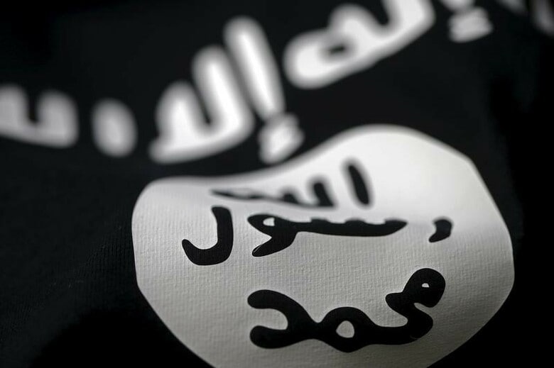４月１２日、米国のワーク国防副長官は、過激派組織「イスラム国」（ＩＳ）打倒に向けた各国との協調作戦を強化しており、大規模なサイバー攻撃を初めて実行していると記者団に明らかにした。写真はイスラム国の旗。サラエボで２月撮影（２０１６年　ロイター/Dado Ruvic）