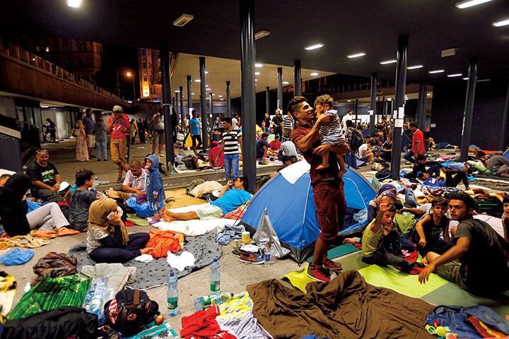 移民・難民のマイナス面ばかりが語られるが（15年、ハンガリーの首都ブダペスト）　Laszlo Balogh-REUTERS