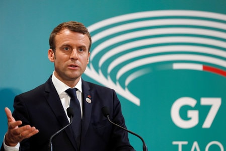 　５月２９日、６月に行われるフランス国民議会（下院）選挙に関する世論調査では、マクロン大統領の政党「共和国前進」の得票率がトップになると見込まれている。写真はタオルミーナで行われたG7サミットで記者会見に応じる同大統領。２７日撮影（２０１７年　ロイター／PHILIPPE WOJAZER）