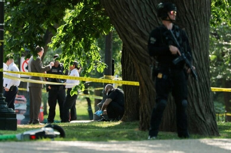 ５月４日、米首都ワシントンで発生した銃撃事件現場周辺で捜査を行うシークレットサービス。REUTERS/Jonathan Ernst